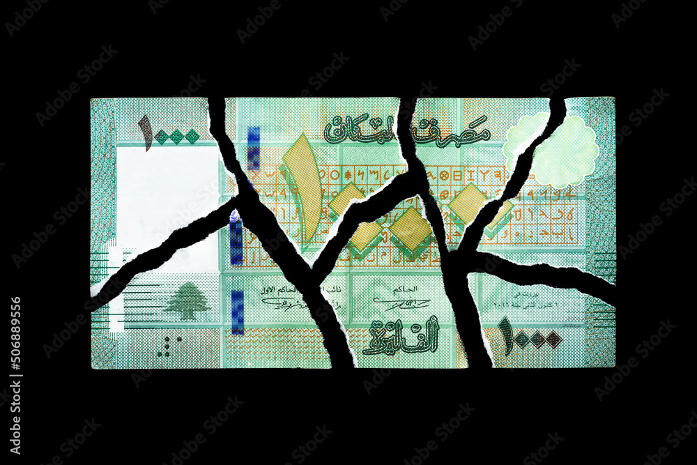 Ripped one thousand Lebanese pounds bill, currency of Lebanon