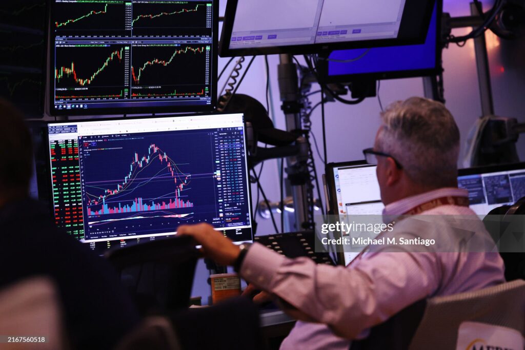 NEW YORK, NEW YORK - AUGUST 20: Traders work on the floor of the New York Stock Exchange during morning trading on August 20, 2024 in New York City. Stocks opened up with little change as the S&P 500 attempts to continue consecutive days of gains.  (Photo by Michael M. Santiago/Getty Images)