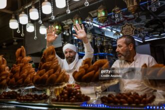 DAMASCUS, SYRIA - DECEMBER 23: People do shopping at Al-Hamidiyeh Souq after the fall of the 61-year-old Baathist regime in the capital Damascus, Syria on December 23, 2024. A new era began for the Syrian economy with hopes for recovery and rebuilding after years of conflict. (Photo by Emin Sansar/Anadolu via Getty Images)