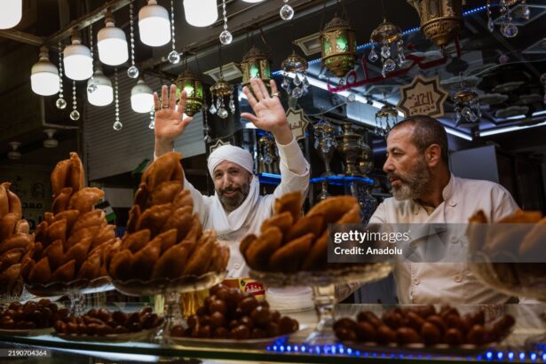 DAMASCUS, SYRIA - DECEMBER 23: People do shopping at Al-Hamidiyeh Souq after the fall of the 61-year-old Baathist regime in the capital Damascus, Syria on December 23, 2024. A new era began for the Syrian economy with hopes for recovery and rebuilding after years of conflict. (Photo by Emin Sansar/Anadolu via Getty Images)