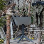 KUPIANSK, UKRAINE - APRIL 7: An antenna of the Starlink satellite-based broadband system stands in a yard next to the wooden posts on which shoes are dried on April 7, 2024 in Kupiansk, Ukraine. On 24 February 2022, Russia invaded Ukraine in an escalation of the Russian-Ukrainian War that started in 2014. After retreating from Kupiansk in September 2022, Russian military repeatedly shelled the city. (Photo by Yan Dobronosov/Global Images Ukraine via Getty Images)