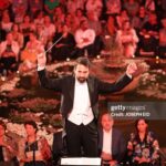 Lebanese maestro Lubnan Baalbaki conducts the orchestra during a performance by Egyptian Mezzo Soprano Farrah El-Dibany at the Beiteddine Festival, in the historic eponymous palace of Lebanon's Chouf mountains, on July 20, 2023. (Photo by Joseph EID / AFP) (Photo by JOSEPH EID/AFP via Getty Images)
