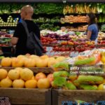 NEW YORK, NY - JULY 11:  Customers shop for fruit at a supermarket in Manhattan on July 11, 2024 in New York City. According to the report released by the Bureau of Labor Statistics, U.S. consumer inflation in June increased 3.0 percent from a year ago, while the Consumer Price Index (CPI) declined 0.1 percent on a seasonally adjusted basis after remaining unchanged in May. (Photo by Liao Pan/China News Service/VCG via Getty Images)