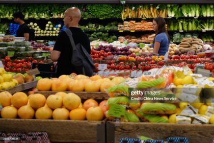 NEW YORK, NY - JULY 11:  Customers shop for fruit at a supermarket in Manhattan on July 11, 2024 in New York City. According to the report released by the Bureau of Labor Statistics, U.S. consumer inflation in June increased 3.0 percent from a year ago, while the Consumer Price Index (CPI) declined 0.1 percent on a seasonally adjusted basis after remaining unchanged in May. (Photo by Liao Pan/China News Service/VCG via Getty Images)