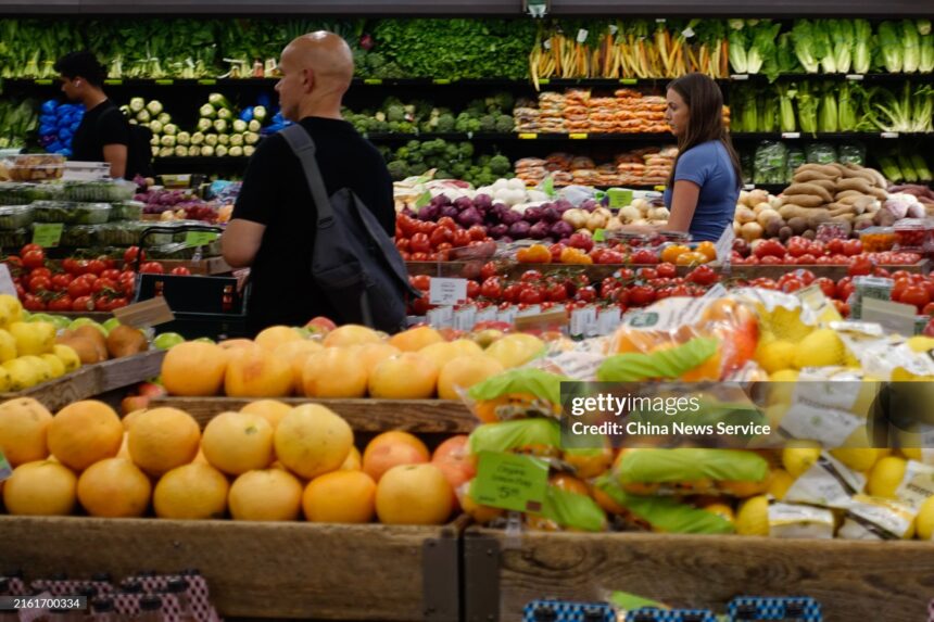 NEW YORK, NY - JULY 11:  Customers shop for fruit at a supermarket in Manhattan on July 11, 2024 in New York City. According to the report released by the Bureau of Labor Statistics, U.S. consumer inflation in June increased 3.0 percent from a year ago, while the Consumer Price Index (CPI) declined 0.1 percent on a seasonally adjusted basis after remaining unchanged in May. (Photo by Liao Pan/China News Service/VCG via Getty Images)