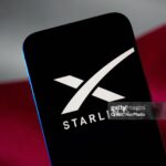 The SpaceX Starlink logo and app are seen in this illustration photo taken in Warsaw, Poland on 09 March, 2025. (Photo by Jaap Arriens/NurPhoto via Getty Images)