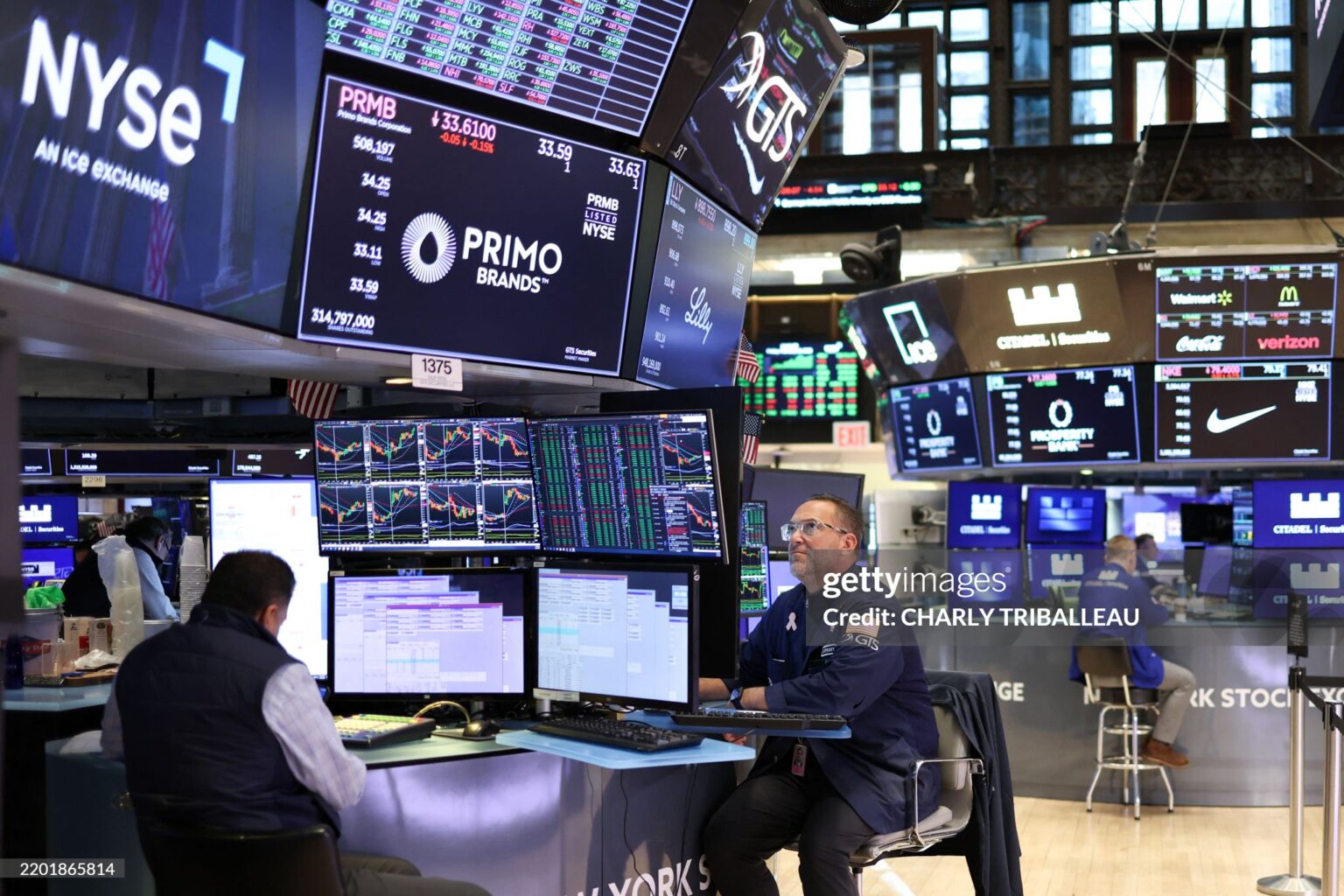 Traders work on the floor of the New York Stock Exchange (NYSE) in the Financial District in New York City on February 28, 2025. (Photo by CHARLY TRIBALLEAU / AFP) (Photo by CHARLY TRIBALLEAU/AFP via Getty Images)